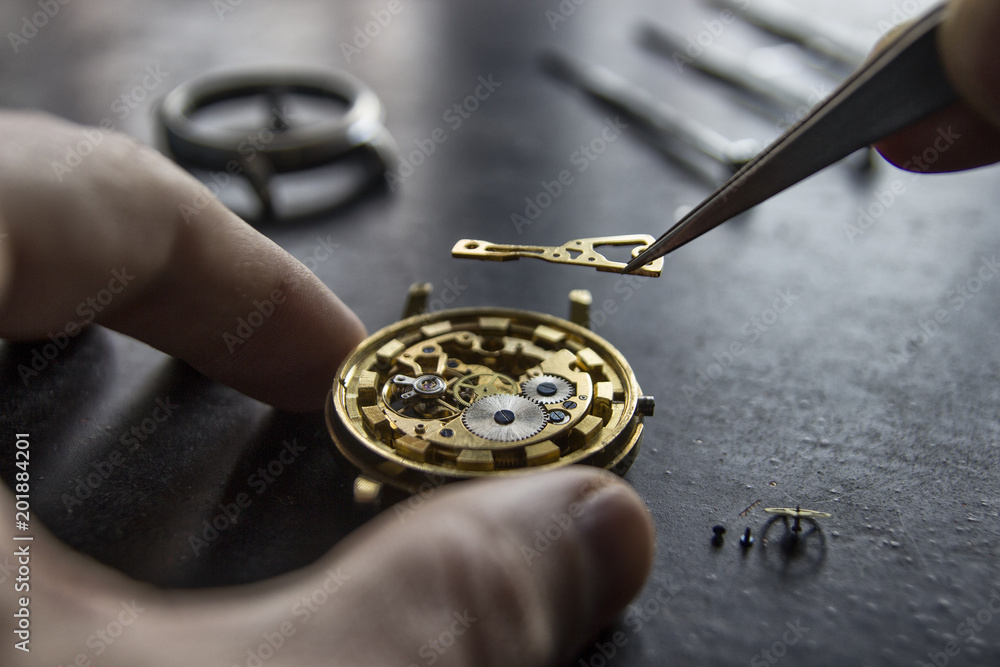 Process of installing a part on a mechanical watch, watch repair Process of installing a part on a mechanical watch, watch repair