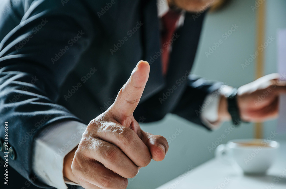 young business man finger touching in screen