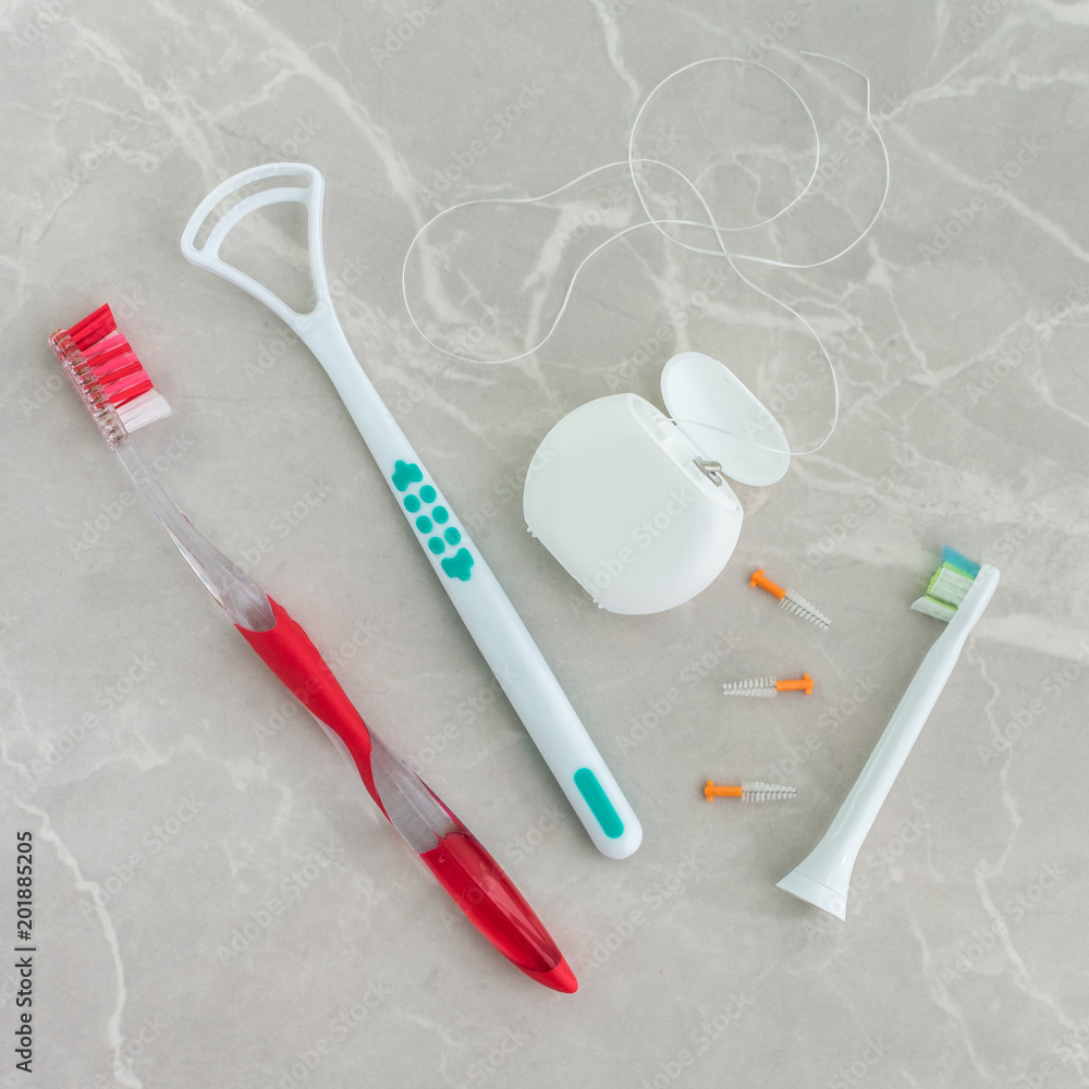 Oral hygene tools on a mrable background. Oral hygene tools on a mrable background.