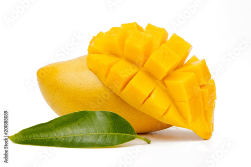 Mango fruit slice with green leaf isolated white background