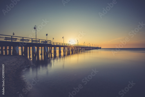 Wallpaper Mural Amazing colorful sunrise over the pier in Gdynia Orlowo. Sunrise over the sea. Torontodigital.ca