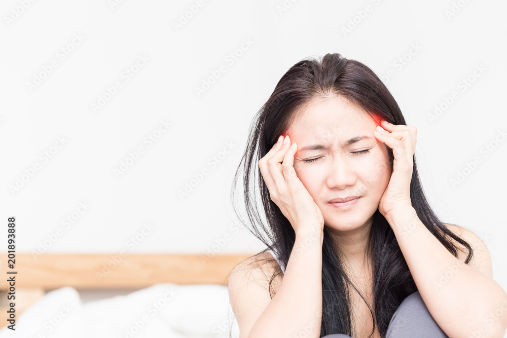Asian young Woman have a Migraine after wake up,Healthcare concept Asian young Woman have a Migraine after wake up,Healthcare concept
