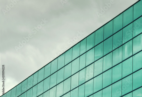 Abstract architecture. Close up of a building facade made of glass panels
