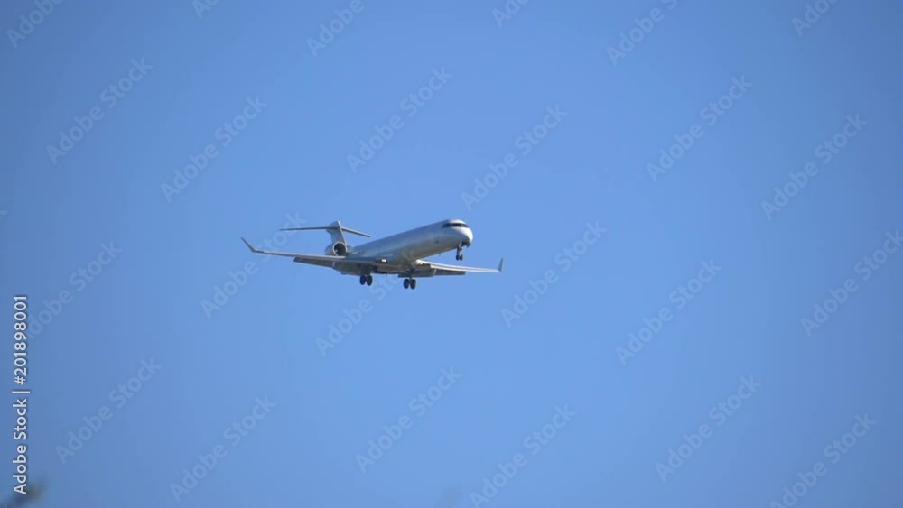 Professional video of airplane flying overhead in slow motion 180fps Professional video of airplane flying overhead in slow motion 180fps