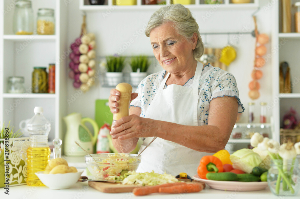 Grandmother cook in the kitchen Grandmother cook in the kitchen
