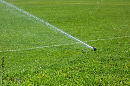 automatic irrigation system for lawns and green grass