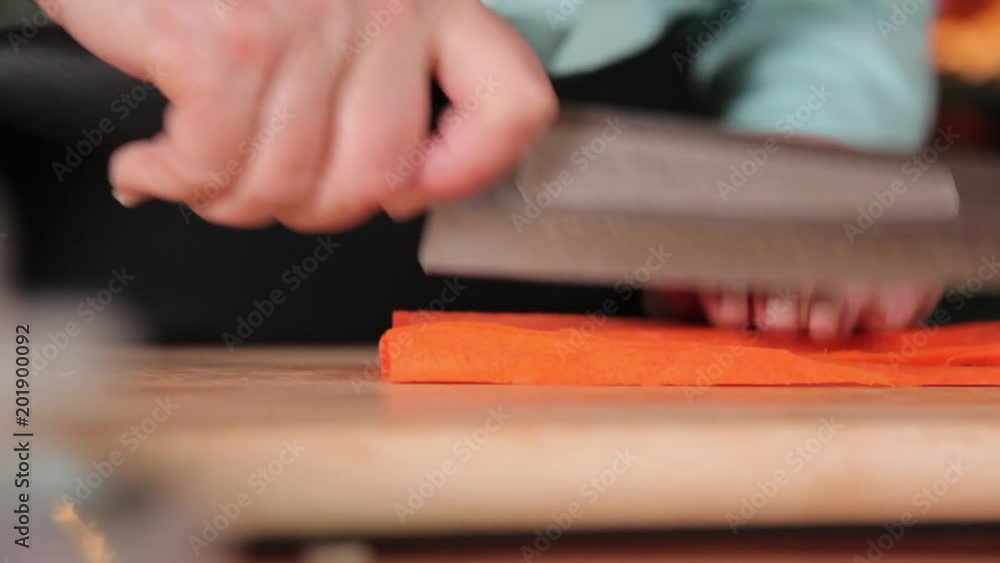 A close up shot of carrots chopped to cubes.