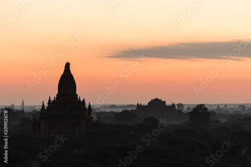 Silhouette of the ancient temples in the archaeological park in Bagan before the sunrise  Myanmar