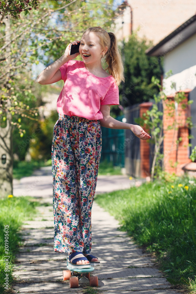 Hipster girl with skate board