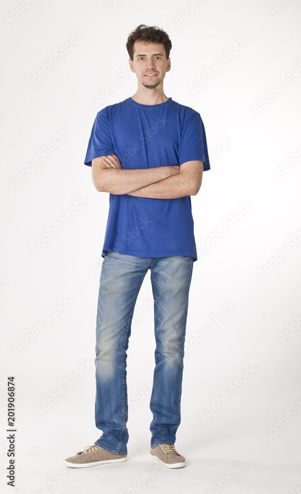 Smiling young guy posing to camera