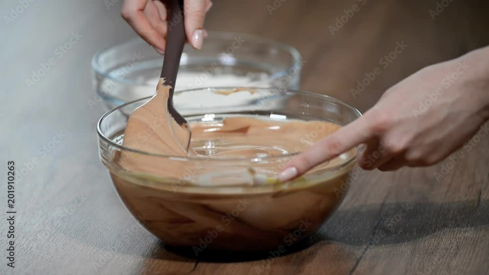 Mixing Cocoa Powder, Flour and Beaten Eggs. Making Chocolate Layer Cake. Mixing Cocoa Powder, Flour and Beaten Eggs. Making Chocolate Layer Cake.