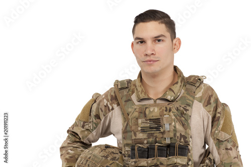 Soldier posing against white