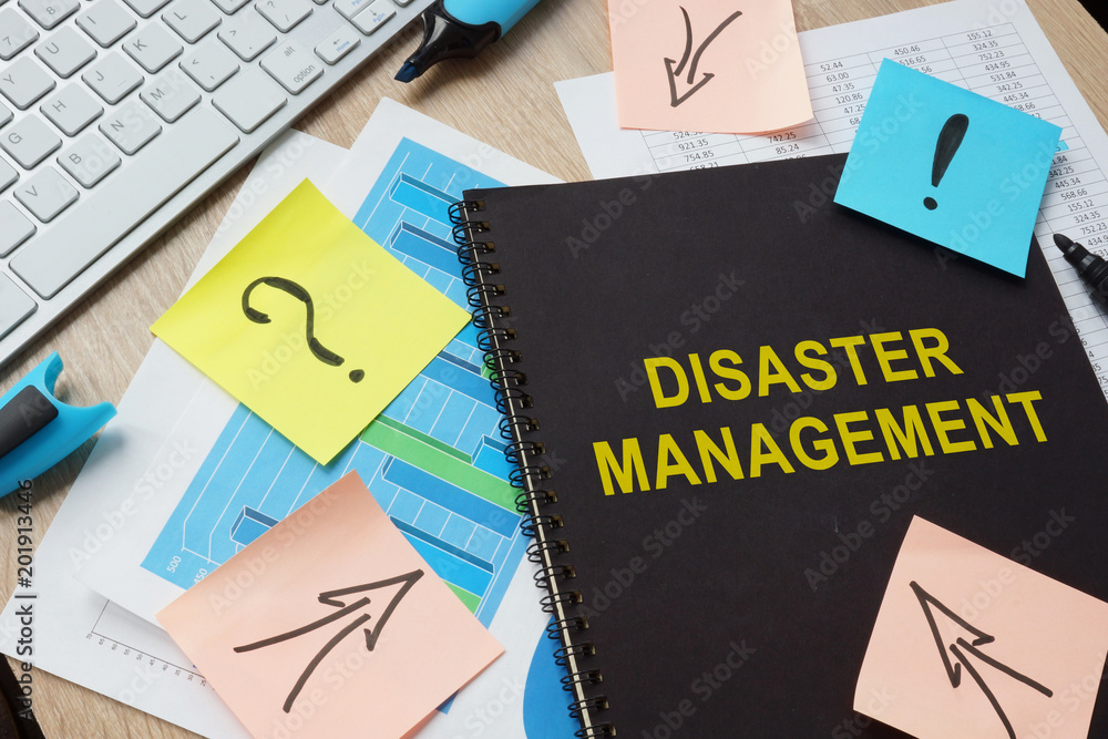 Documents about Disaster Management on a table. Stock Photo | Adobe Stock
