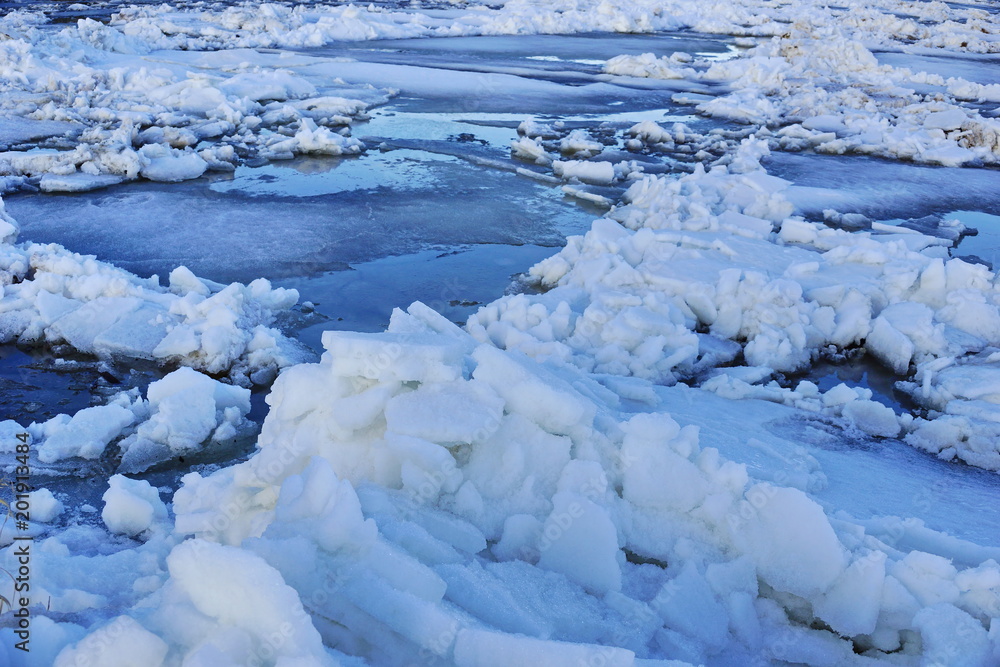 big white and blue pieces of ice and snow. debacle big white and blue pieces of ice and snow. debacle