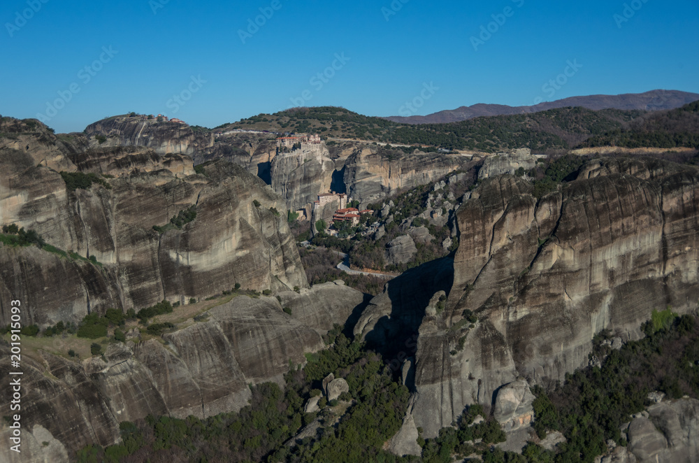 Landscape with monasteries and rock formations in Meteora, Greece.