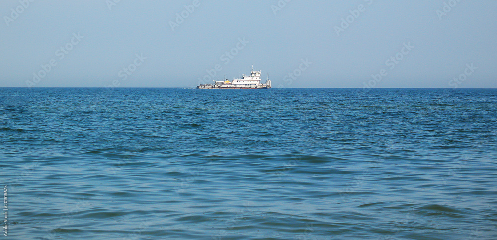 Blue endless sea, on  horizon -  steamship_