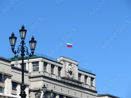 Russian flag over the building of State Duma in Moscow. Russian authority