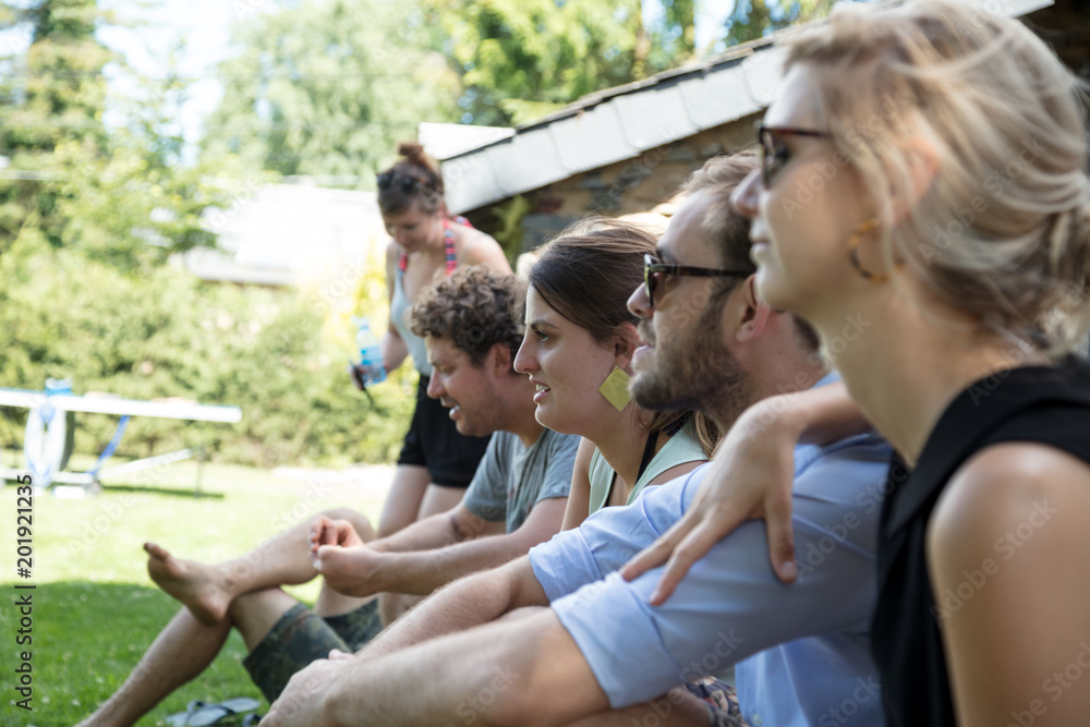 Group of friends enjoying summer in garden Group of friends enjoying summer in garden