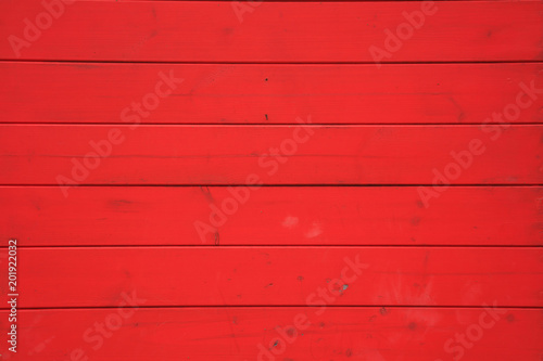 Wooden red background, vintage blank surface, close up view.