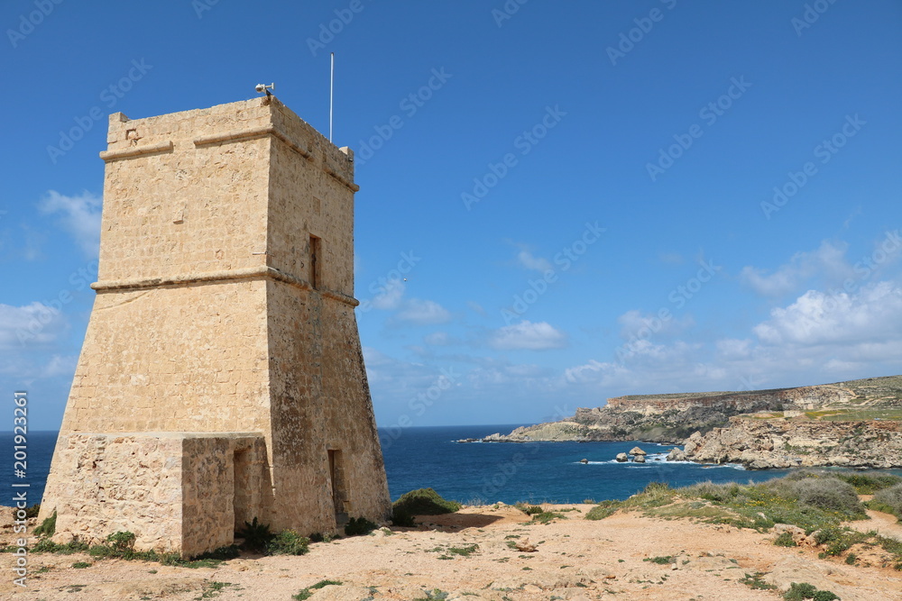 Ghajn Tuffieha Tower at Ghajn Tuffieha Bay on the Mediterranean sea in Malta 