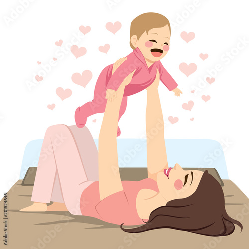 Young mother holding baby g...