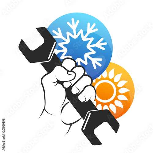 Air conditioner repair wrench in hand