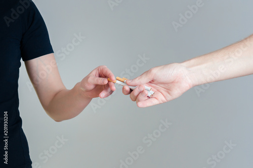 Woman takes a cigarette. hands close up