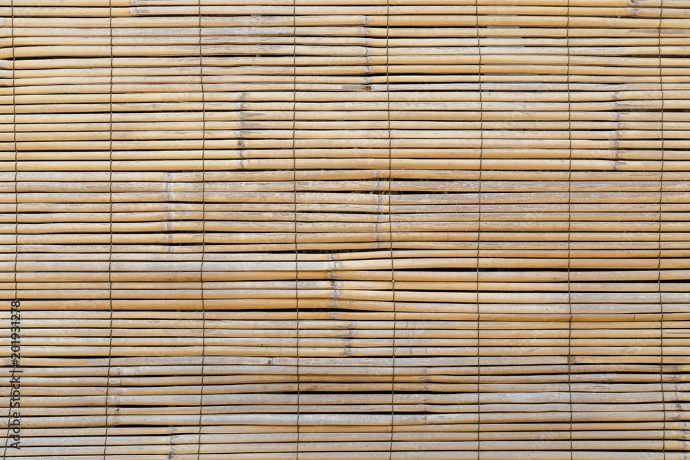Full frame background of aged wooden bamboo blinds, popular in Asia. Full frame background of aged wooden bamboo blinds, popular in Asia.