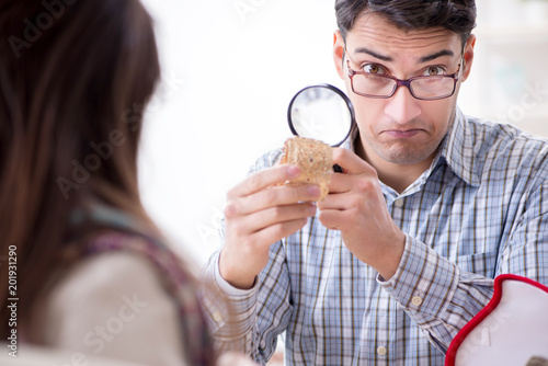 Woman visiting jeweler for jewelery evaluation