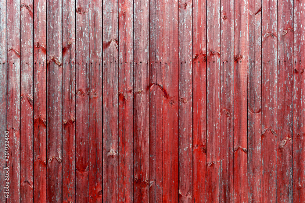 The old red wood texture with natural patterns The old red wood texture with natural patterns