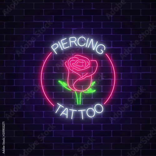 Canvas Print Tattoo and piercing parlor glowing neon signboard with rose emblem