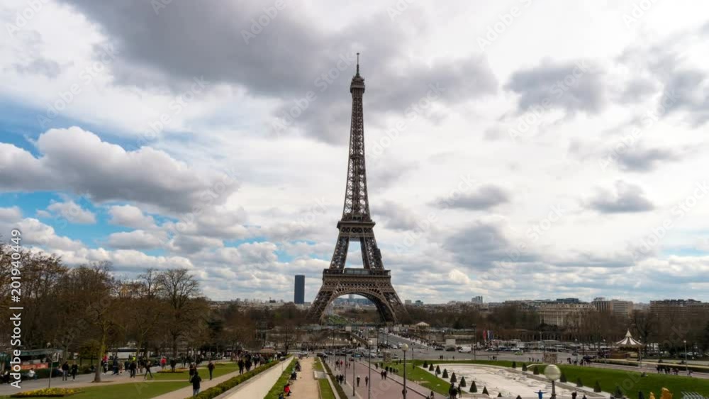 Eiffel Tower with the swimming clouds Eiffel Tower with the swimming clouds
