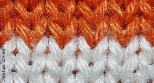 the texture is chunky, two-tone orange-and-white close-up, macro