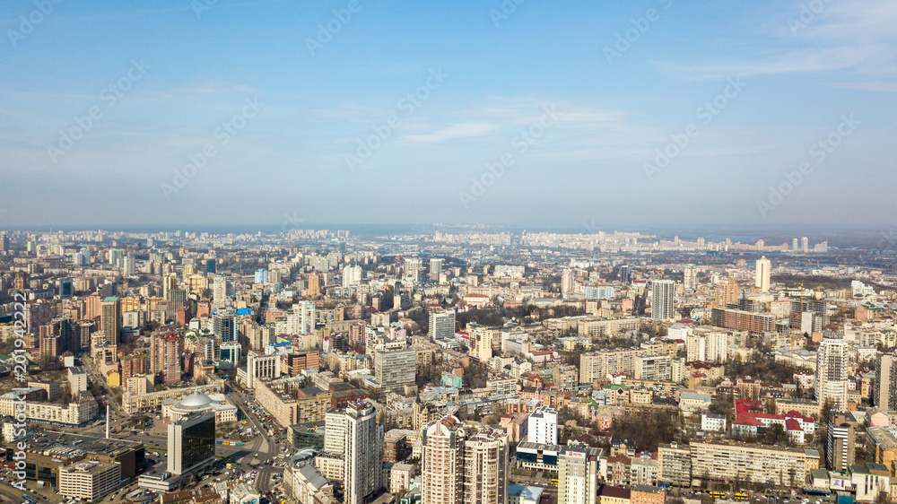 Kiev, city center, panoramic view on a sunny day against the blue sky. Photo from the drone
