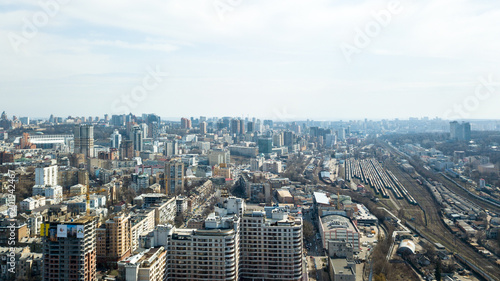 Aerial view of Kiev city center  railway tracks and construction of high-rise buildings  Ukraine
