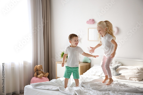 Cute little children jumpin...