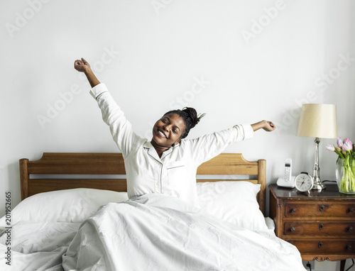 A woman waking up photo