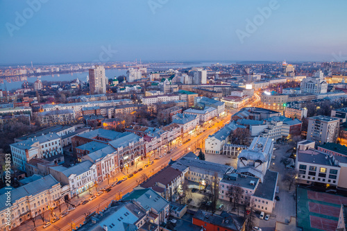Fototapeta Naklejka Na Ścianę i Meble -  Evening Voronezh downtown. Aerial view from skyscraper roof height to Revolution prospect - central street of Voronezh