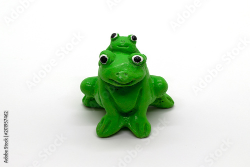 Statue of frog on a white background