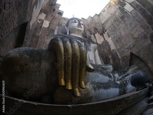 Thai buddhist image at Wat Si Chum temple in Sukhothai Historical Park