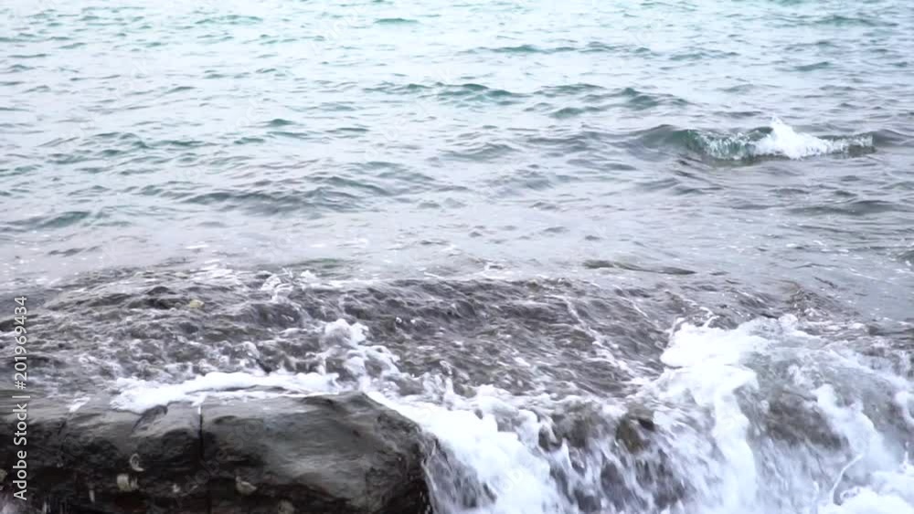 Slow motion Sea waves blow up the beach along beach shores. Sea water erosion Relax and feel comfortable. Slow motion Sea waves blow up the beach along beach shores. Sea water erosion Relax and feel comfortable.