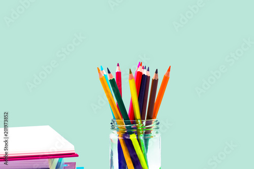 Books ,pen,pencil and office equipment on blue background, education and back to school concept,Clipping path