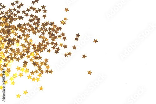 Glittering golden stars on white background