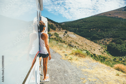 Girl enjoys the view on a motor home