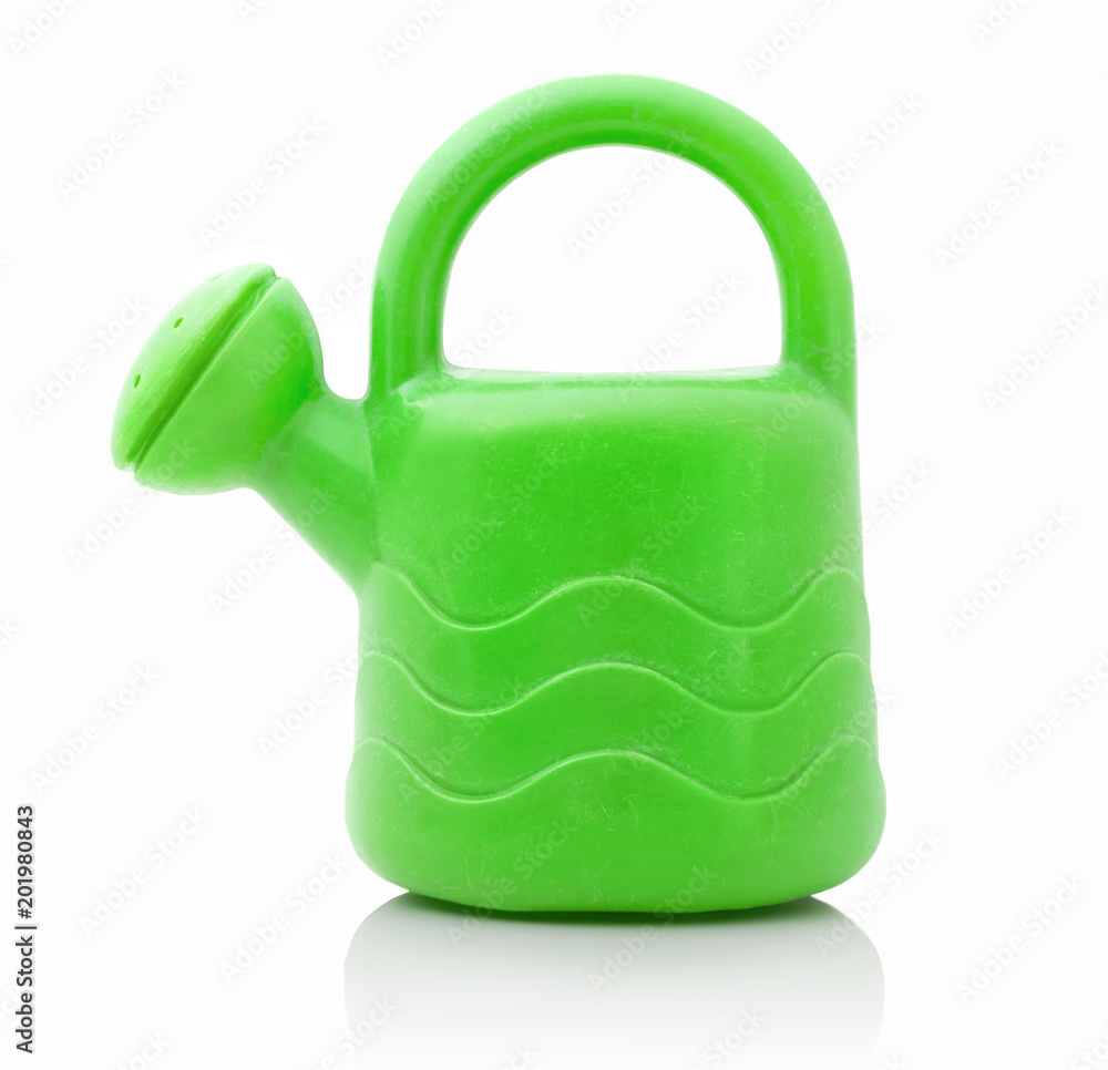 Children´s small green plastic watering can isolated on the white  background. Small green plastic can for watering plants and flowers, for  playing, for kids. Miniature of watering can for children Stock-Foto