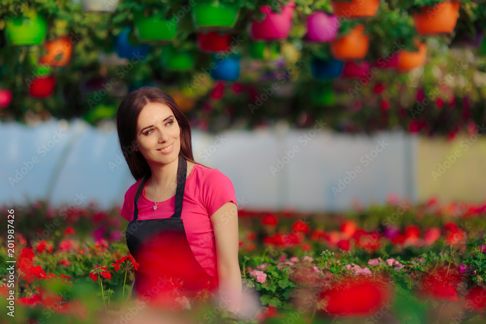 Female Entrepreneur Greenhouse Worker Among Blooming Flowers