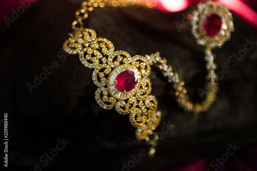 beautiful Indian wedding jewellery in low light 