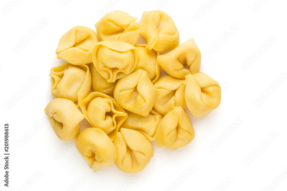 Raw homemade pasta,tortellini with herbs. Raw homemade pasta,tortellini with herbs.