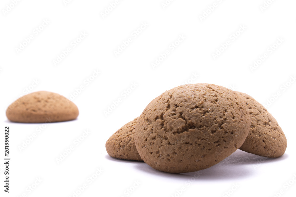 Four round oatmeal cookies on white background Four round oatmeal cookies on white background