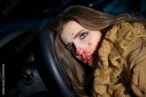 Woman dead in car after accident closeup